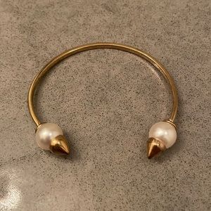Stella and Dot gold woman’s bracelet cuff with pearl details